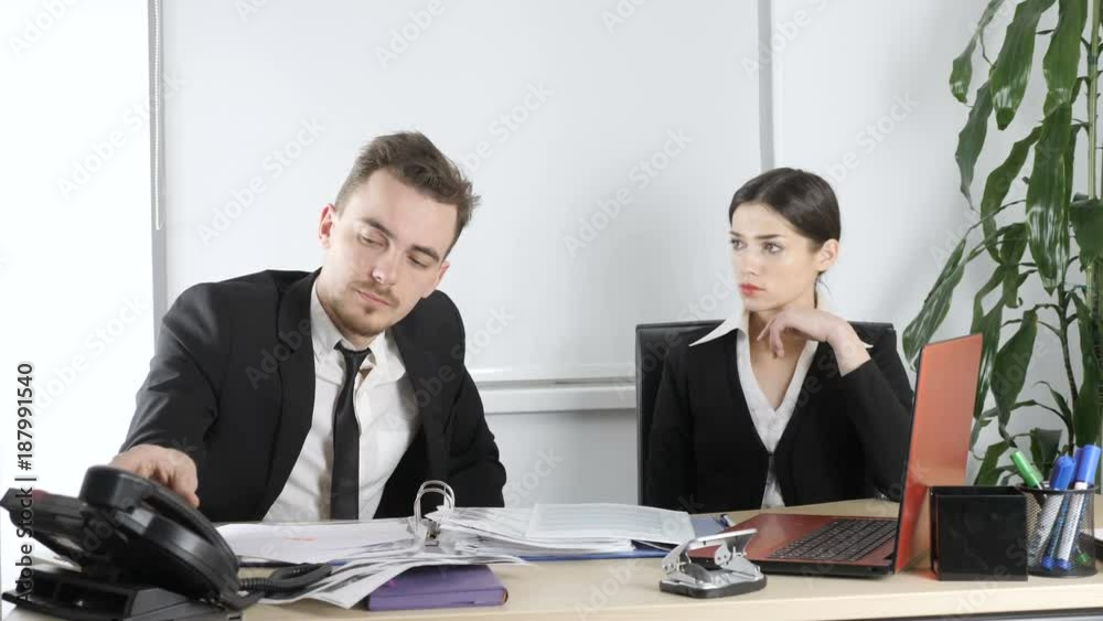 Young man and a woman in costumes are upset because of a broken deal, anger, disappointment, sadness. 60 fps Young man and a woman in costumes are upset because of a broken deal, anger, disappointment, sadness. 60 fps