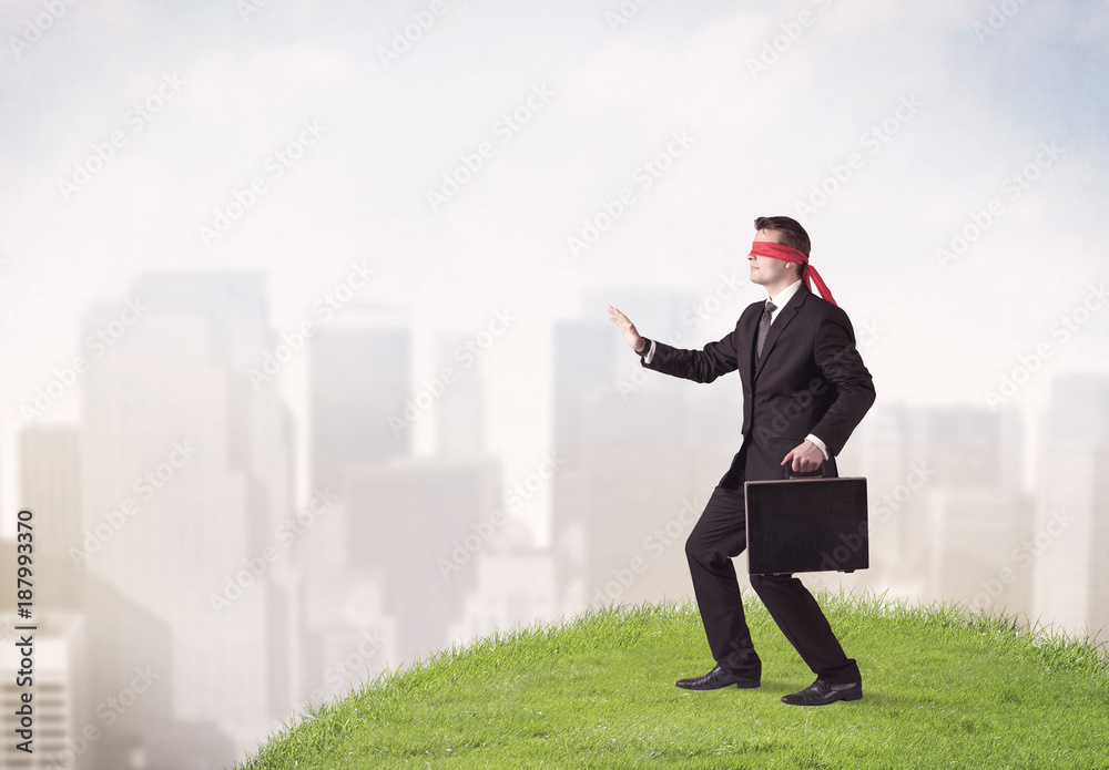 Blindfolded businessman concept Blindfolded businessman concept