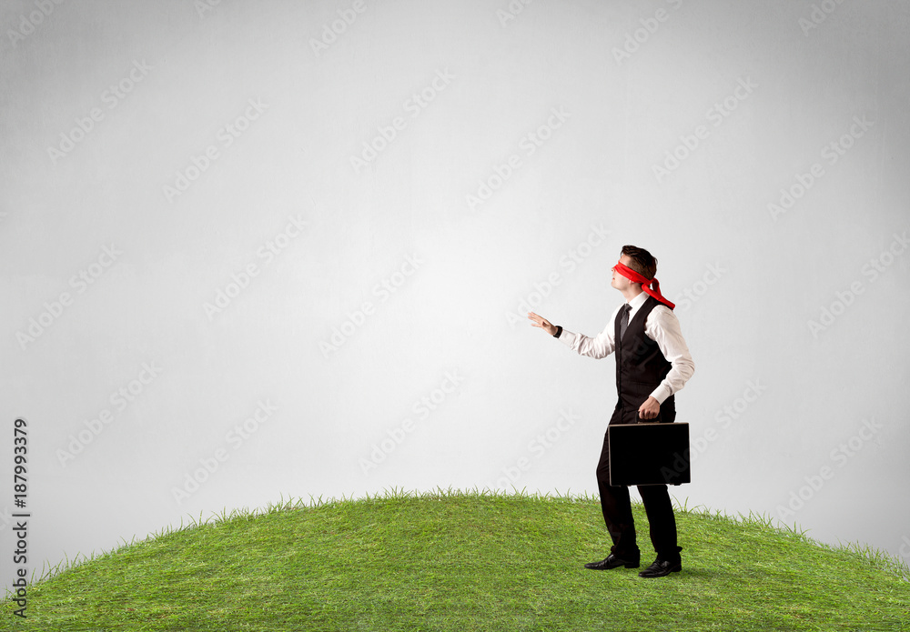 Blindfolded businessman concept