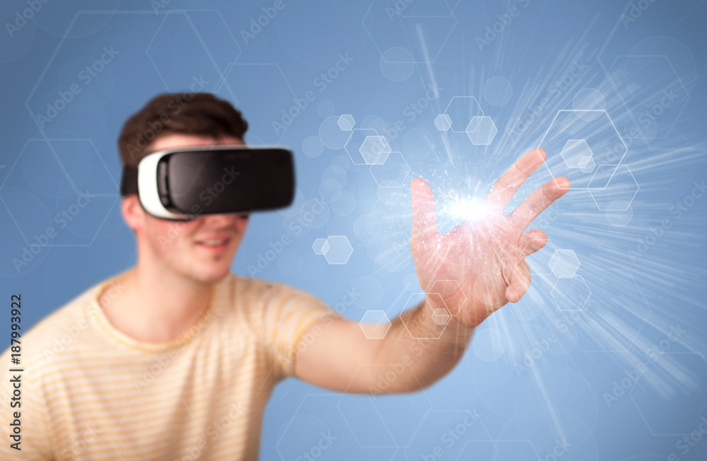 Man wearing virtual reality goggles Man wearing virtual reality goggles
