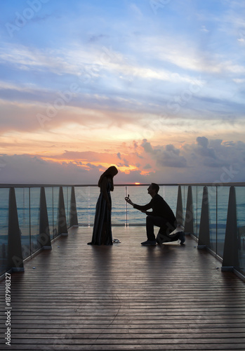 Proposal on beach at Sunset 