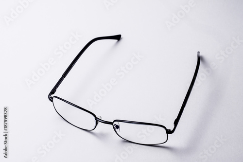 transparent glasses with black frame on white background