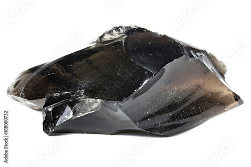 black obsidian from Armenia isolated on white background photo