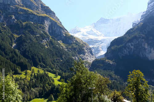 Alpine landscape with huge rocky mountains
