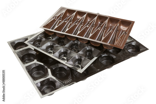 tray for sweets, set of plastic on white background photo