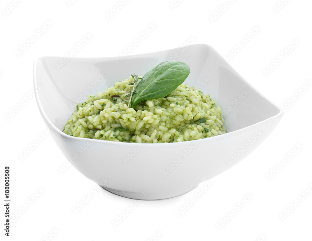 Dish with tasty spinach risotto on white background Dish with tasty spinach risotto on white background
