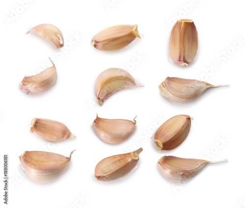 Composition with garlic cloves on white background