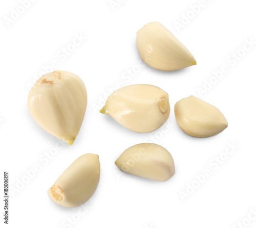 Garlic cloves on white background