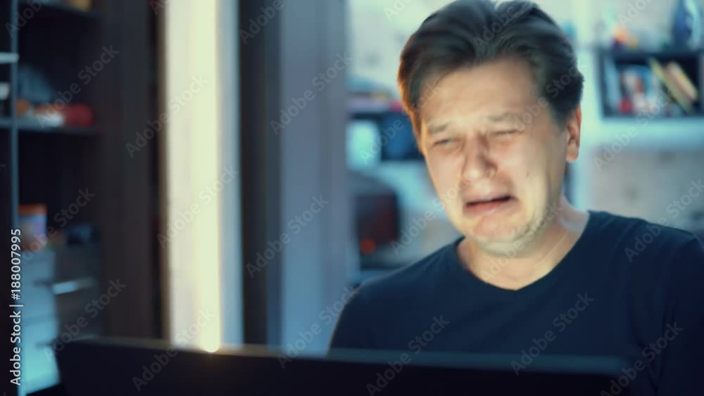 man with laptop, problems at work, bad news