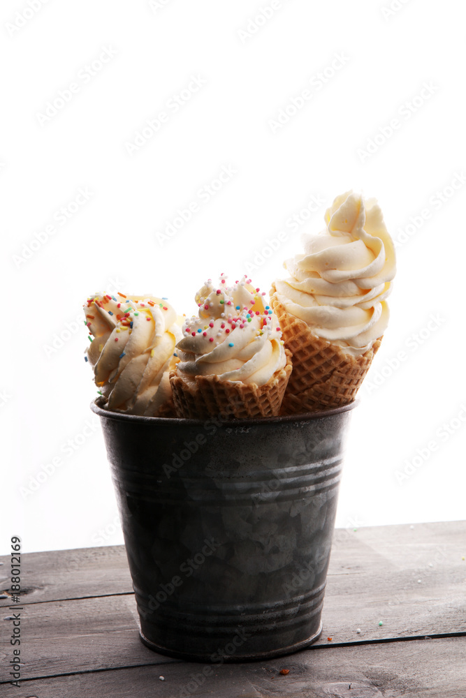 Vanilla frozen yogurt or soft ice cream in waffle cone Vanilla frozen yogurt or soft ice cream in waffle cone