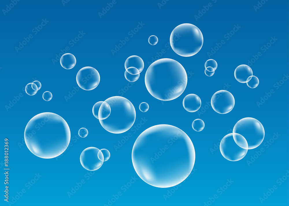  White underwater fizzing air bubbles  on blue   background.