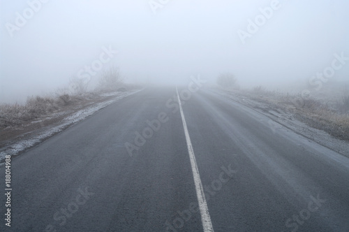 Empty road in thick fog.