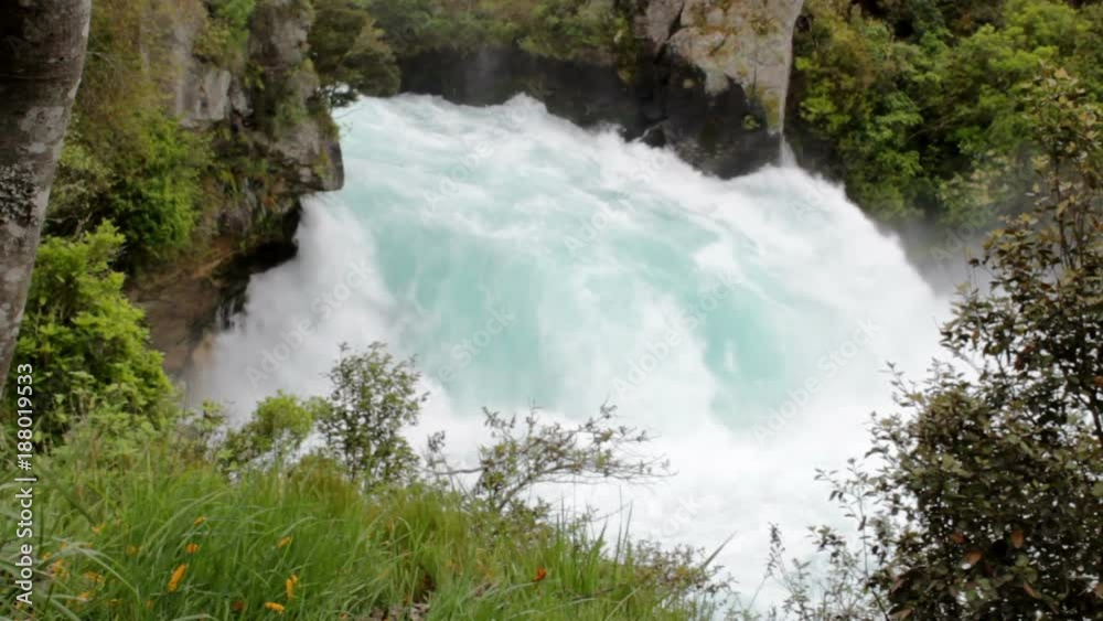 Turquoise blue powerful waterfall, Huka Falls, New Zealand Turquoise blue powerful waterfall, Huka Falls, New Zealand