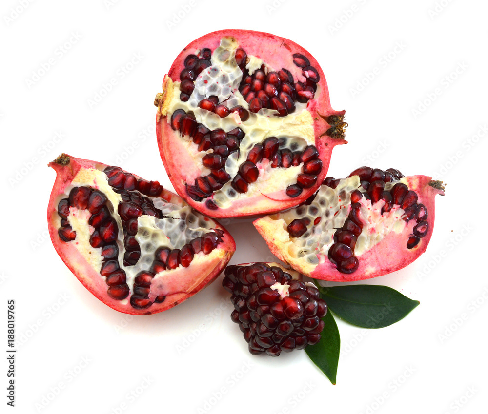 Pomegranate slice isolated on white, clipping path included Pomegranate slice isolated on white, clipping path included