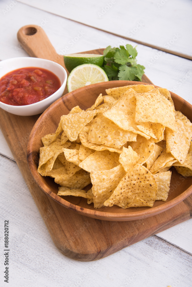 nachos with salsa and lime