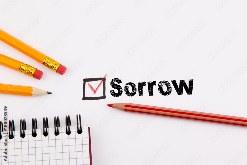 sorrow. Questionnaire with red cross on the white paper. sorrow. Questionnaire with red cross on the white paper.