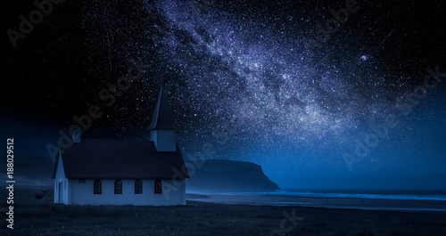 Small church on the beach at night with stars, Iceland