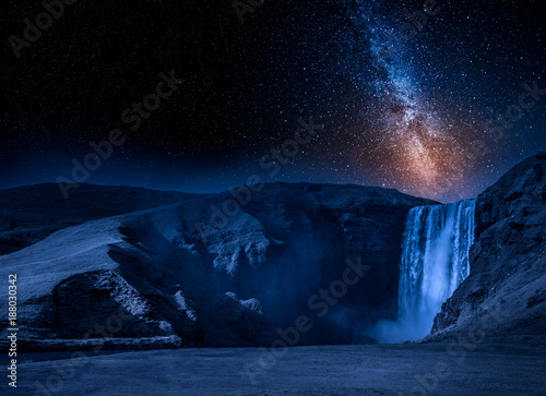Fototapeta Naklejka Na Ścianę i Meble -  Milky way and spectacular Skogafoss waterfall in Iceland