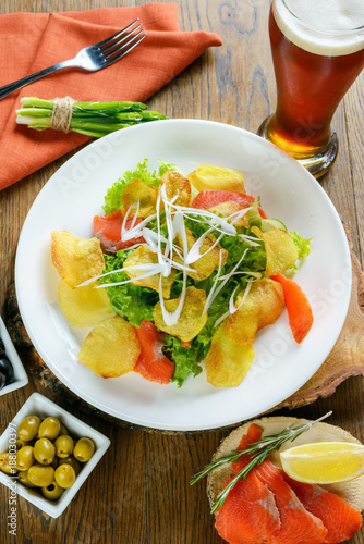 Salty salad with beer photo