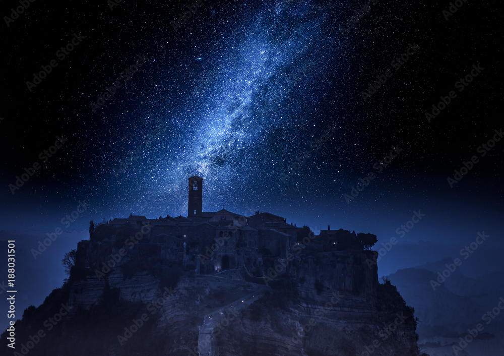 Old town of Bagnoregio at night with milky way,Italy