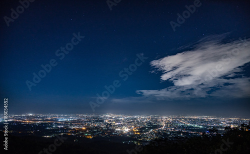 cityscape at night sky with many stars. concept for background
