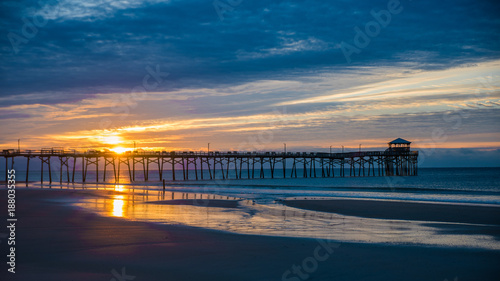 Fototapeta Naklejka Na Ścianę i Meble -  Atlantic beach pier on the North Carolina coast at sunset