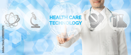 Doctor Points at HEALTH CARE TECHNOLOGY and Icons photo