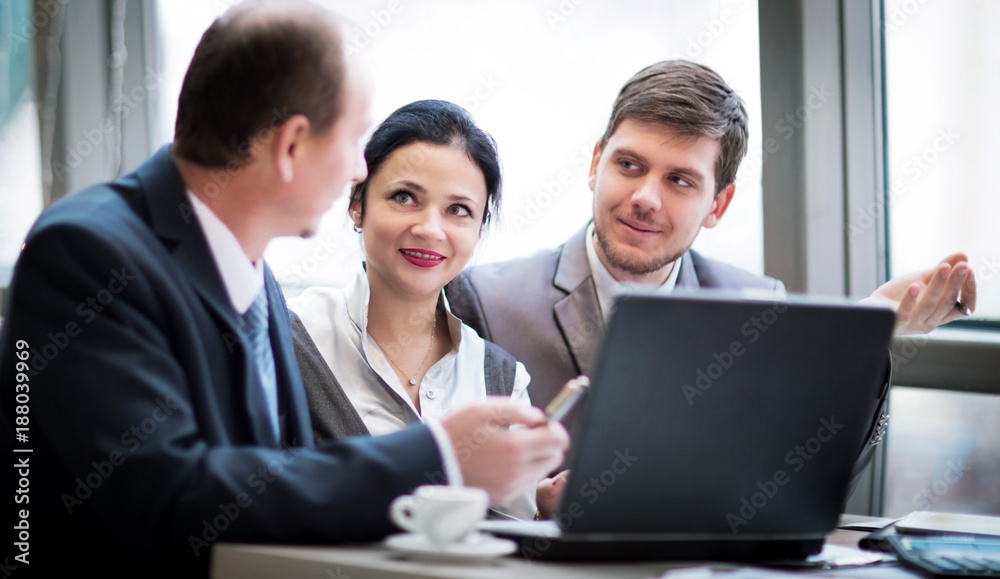 Business team working together to achieve better results, in the office Business team working together to achieve better results, in the office