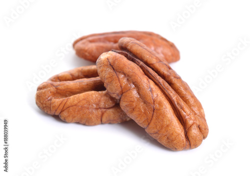 Pecan nuts pile on white background isolated