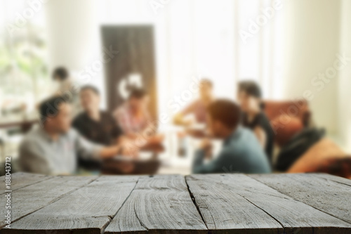 Desk wood space platform with business people in a meeting at office in morning lightFor product display montage.
 photo