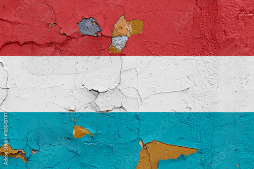 Luxembourg flag painted on a weathered concrete wall