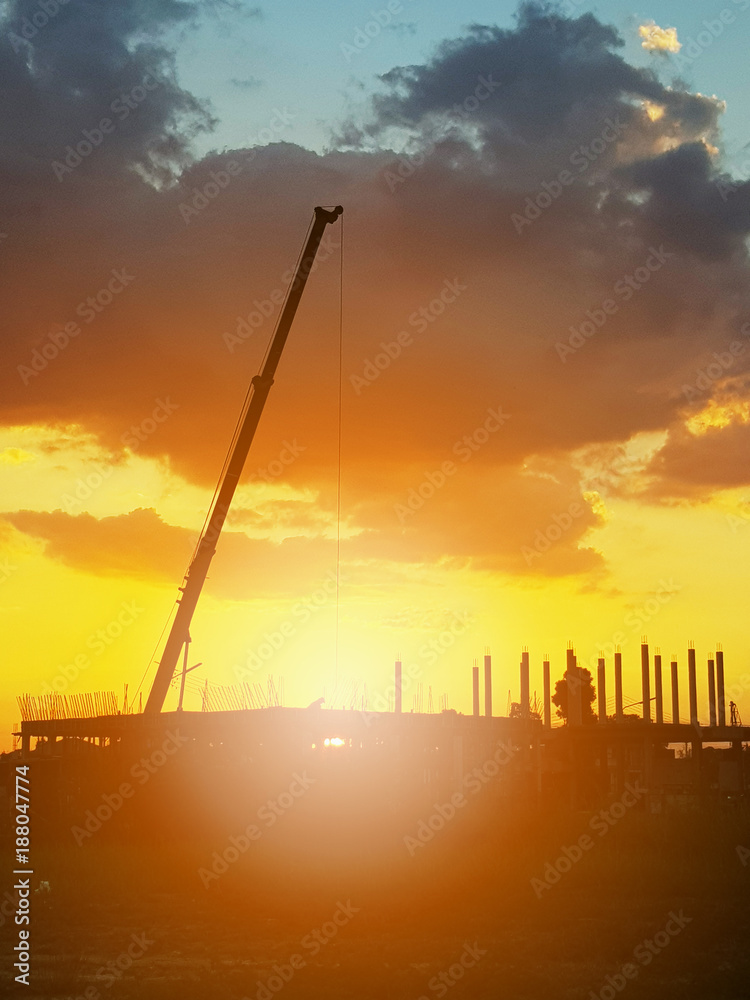 silhouette house building at construction site sunset background