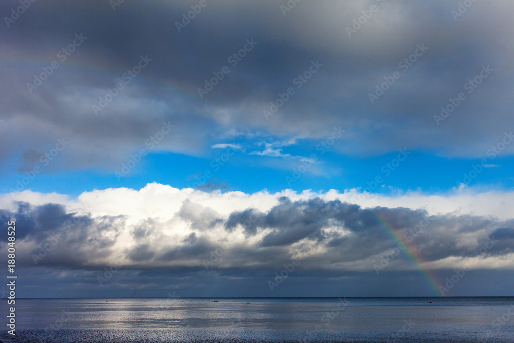Obraz premium Rainbow over Baltic sea.
