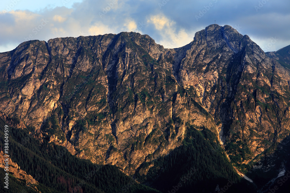 Poland, Tatra Mountains, Zakopane - Giewont, Szczerba and Dlugi Giewont peaks during sunset
