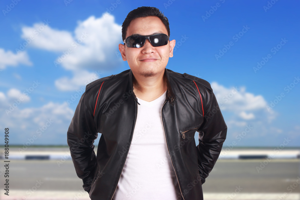 Asian Man in Black Leather Jacket Smiling Asian Man in Black Leather Jacket Smiling