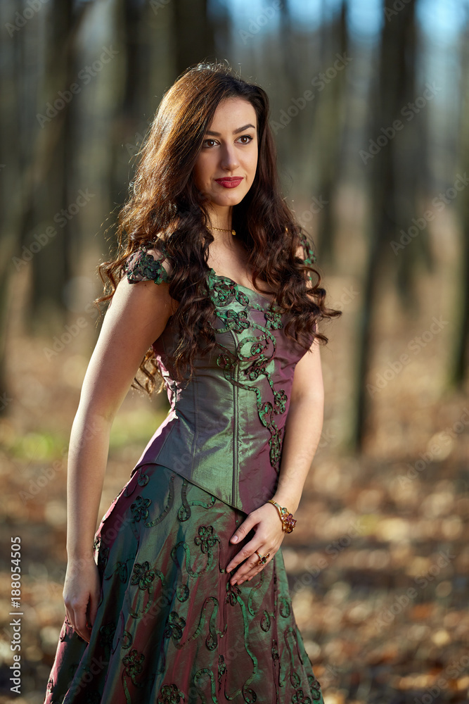 Portrait of a woman in green dress outdoor Portrait of a woman in green dress outdoor