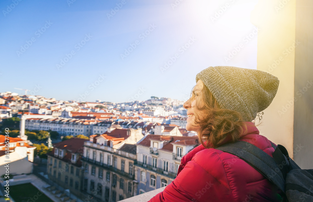 beautiful young student student tourist in Lisbon, view of the city, Portugal - a popular destination for traveling in Europe