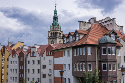 Row of townhouses in Klodzko town, Poland - Town Hall tower on background