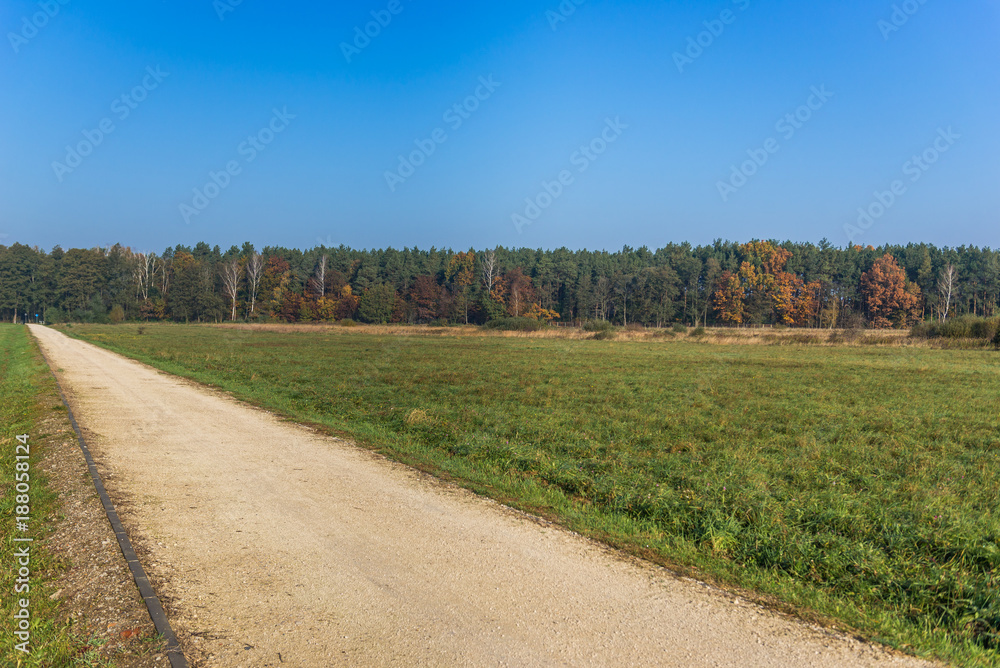 Obraz premium Dust road in Stare Babice commune near Warsaw, Poland