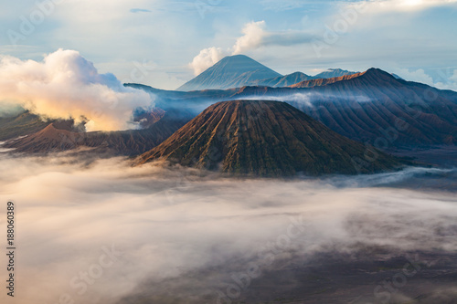 Bromo volcano and mount Batok (Gunung Batok) with cloudy smoke in early morning, East Java, Indonesia