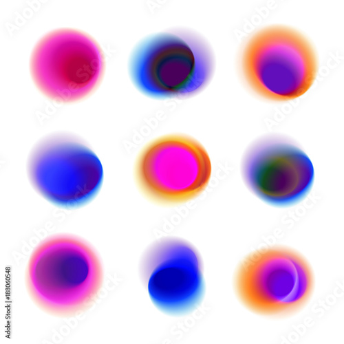 Set of gradient circles of vibrant colors. Red, pink, purple, blue transparent dots. Rainbow colored collection of blurred round spots on white background.