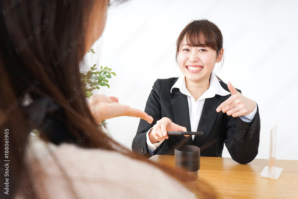 Young woman shopping with electronic money