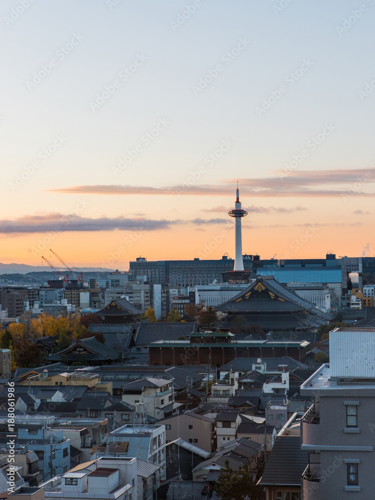 Kyoto tower and cityscape sunrise view.