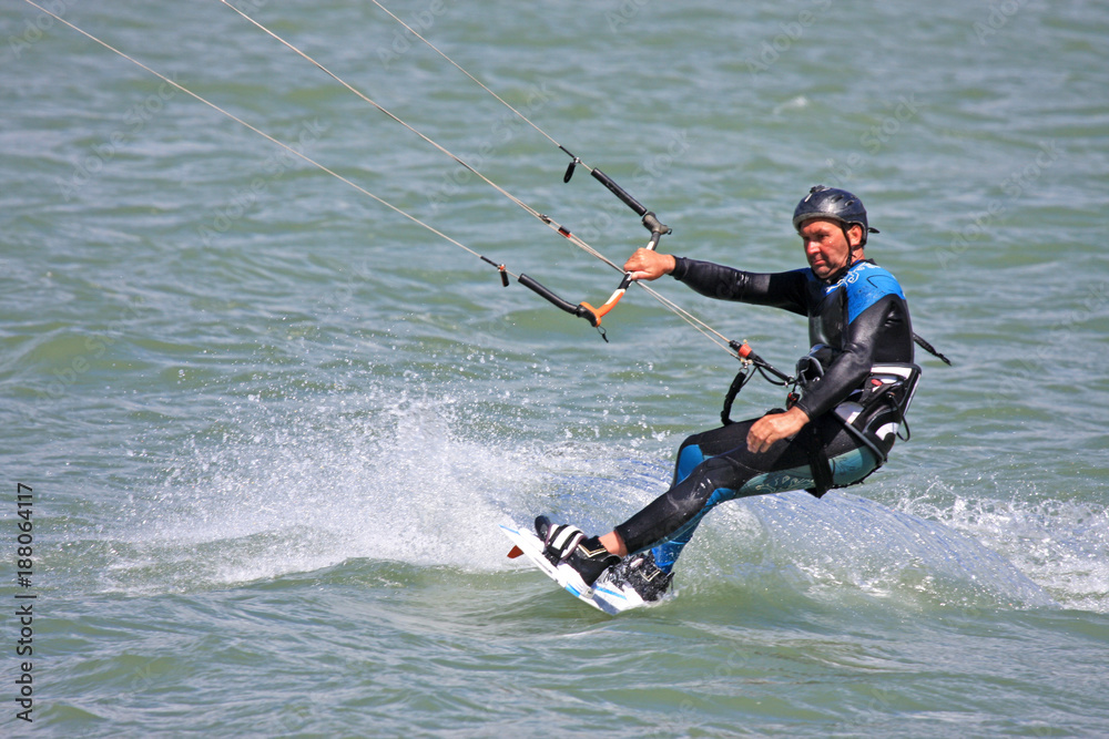 Fototapeta premium kitesurfer riding