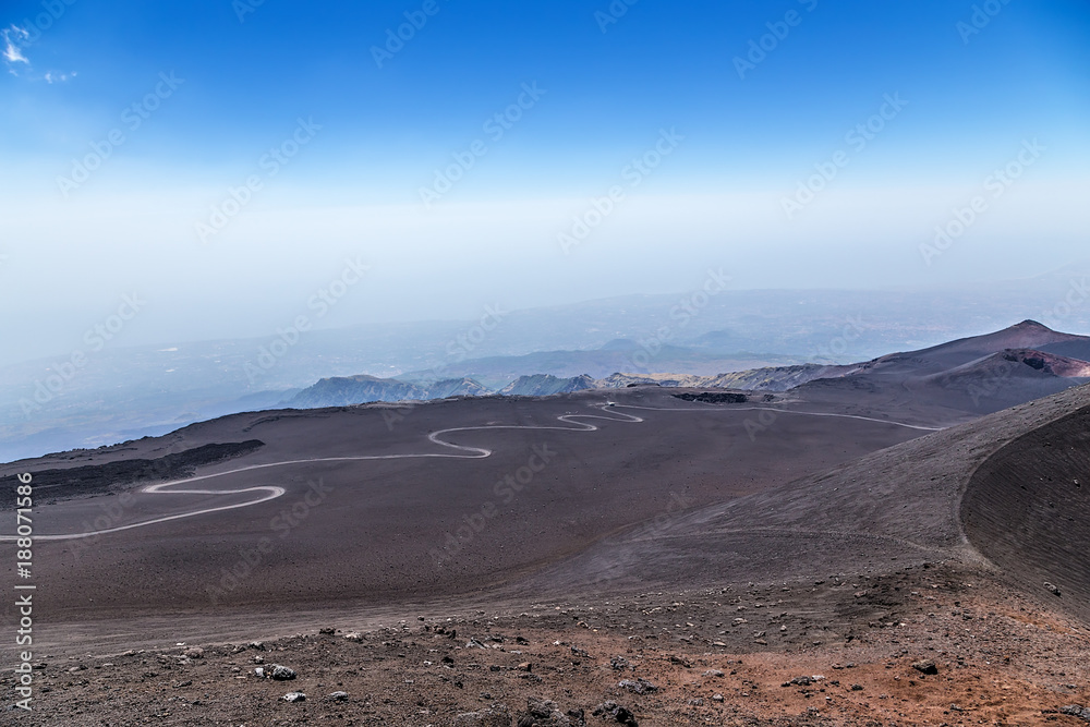 The volcano of Etna, Sicily, Italy. Road - serpentine, leading between the craters to the top of the volcano