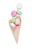 macaroons in a waffle cone on white background.