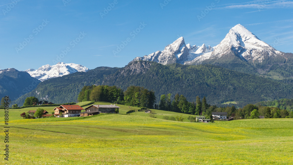 Traditional Alpine spring panoramic landscape in Berchtesgaden with Watzmann mount
