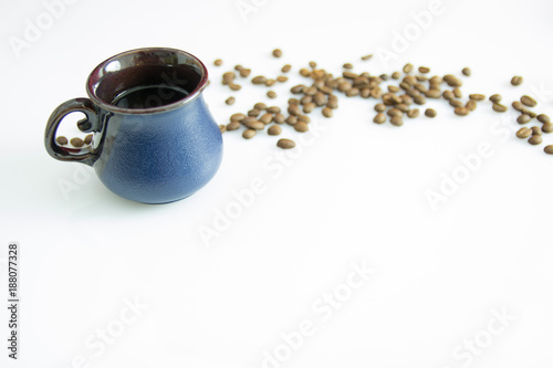 cup of coffe with coffe beans on white background