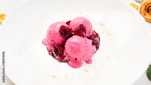 delicious refreshing pink ice cream balls concept. cold restaurant dessert. sweets for children