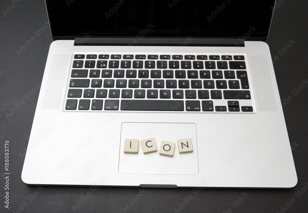 Virtual currency called icon written with letters on a modern laptop. Crypto currency concept image. Virtual currency called icon written with letters on a modern laptop. Crypto currency concept image.